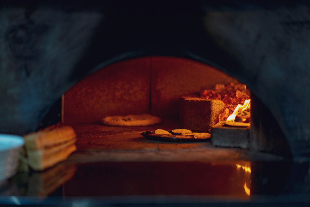 oven, pizza oven, with a little fitre on the right - image used in article about the "lightining" kawok energy of the maya calendar